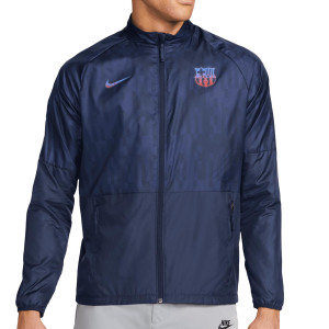 /D/M/DM2966-451_chaqueta-impermeable-color-z-purpura-oscuro-nike-barcelona-repel-academy-all-weather-fan-graphics_1_completa-frontal.jpg