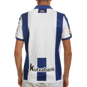 /7/0/700006270001_camiseta-blanco--azul-macron-real-sociedad-autentica-2024-2025_2_completa-trasera.jpg
