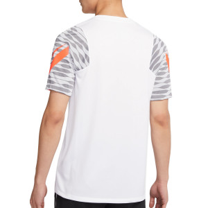 /C/W/CW5843-101_camiseta-blanca-y-naranja-nike-dri-fit-strike-21_2_completa-trasera.jpg