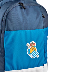 /7/0/700007560001_mochila-macron-real-sociedad-2024-2025-color-azul_3_detalle-escudo.jpg