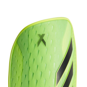 /H/C/HC0623_espinilleras-adidas-x-pro-color-verde_3_detalle-colocacion.jpg