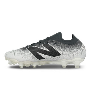 /S/T/ST1FLG45_botas-futbol-new-balance-tekela-low-laced-fg-v4--color-gris_3_interior-pie-derecho.jpg