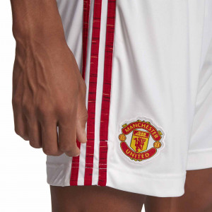 /f/m/fm4289_imagen-de-los-pantalones-de-futbol-primera-equipacion-adidas-manchester-united-fc-2020-2021-rojo-blanco_3_detalle-escudo.jpg