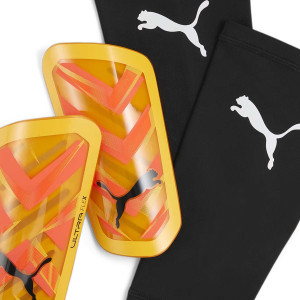 Puma Ultra Flex Sleeve - Espinilleras de fútbol Puma con mallas de sujeción - amarillas mostaza