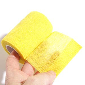 Venda adhesiva Rinat Cohesive Tape 7,5 cm x 4,5 m - Venda elástica adhesiva para sujeción de espinilleras Rinat (7,5 cm x 4,5 m) - amarilla