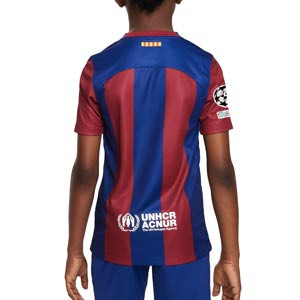 Camiseta Nike Barcelona niño 2023 2024 Dri-Fit Stadium UCL - Camiseta infantil de la primera equipación Nike del FC Bracelona de la Champions League 2023 2024 - azulgrana