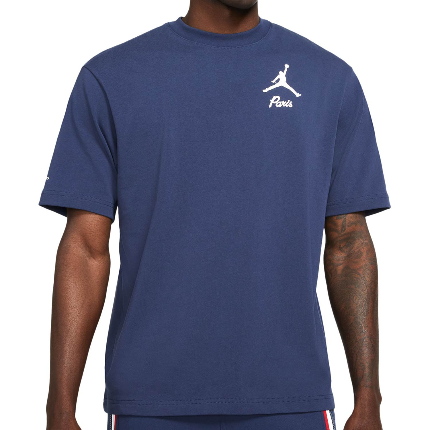 En la cabeza de Gigante Anuncio Camiseta Nike PSG x Jordan Statement azul marino | futbolmania