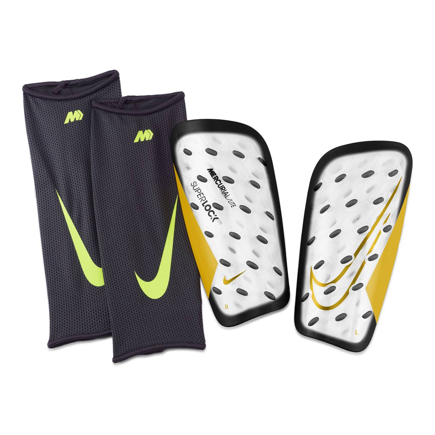 Espinilleras nike doradas clearance