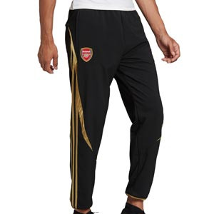 Pantalón adidas Arsenal TeamGeist Woven - Pantalón largo de entrenamiento adidas del Arsenal - negro, dorado